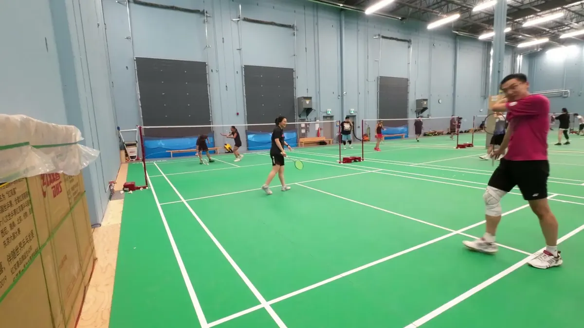 Setup to avoid: boxes beside the camera and a player standing right next to it block part of the court